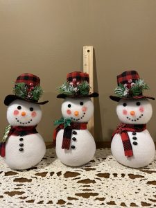 Snowmen with red buffalo check top hats