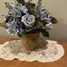 Blue floral arrangement in crock-type container. $20. Available at craft shows or local meet-up delivery.